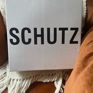 NWT Schultz knee high croc boot. Size 8.5 and with the box.